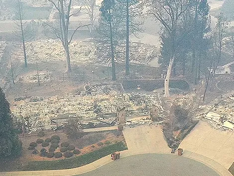 An aerial view of a neighborhood in California destroyed by a camp fire