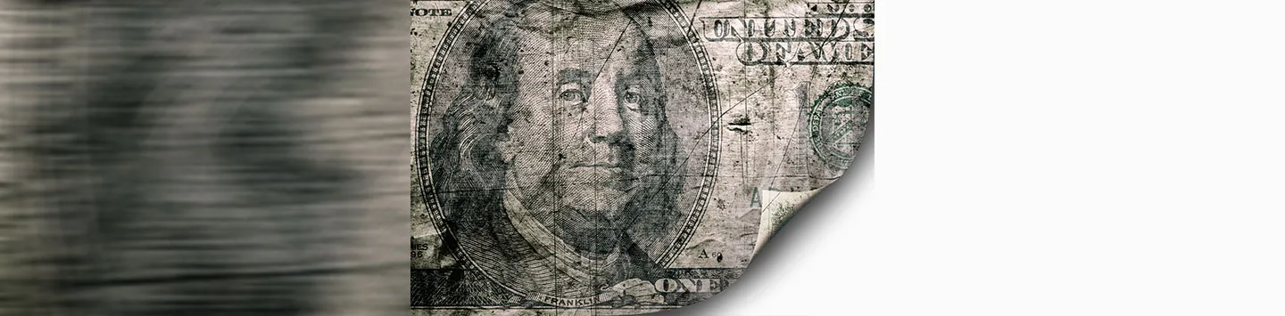 A damaged US $100 bill