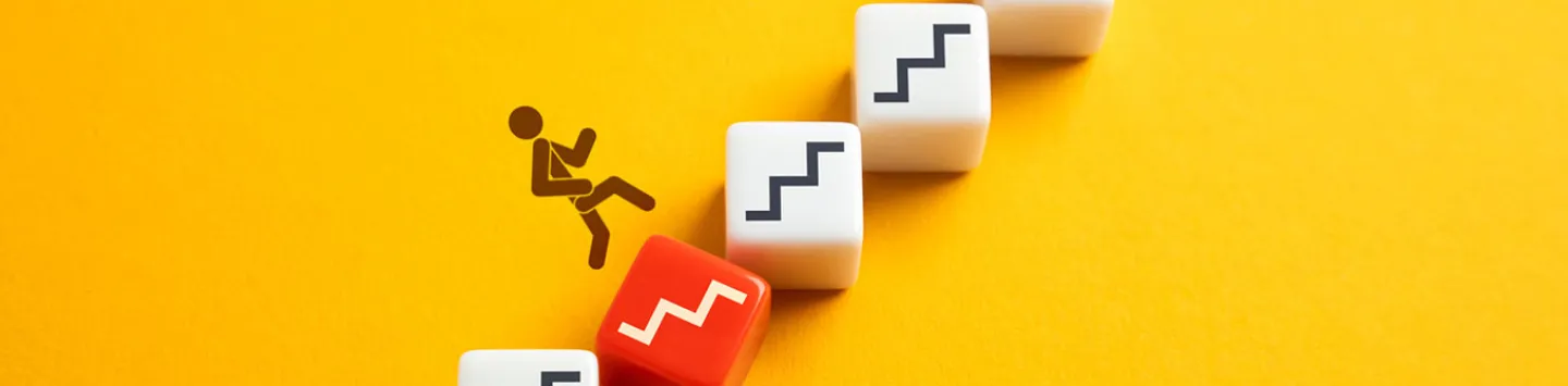 A person encounters a problem when climbing to a goal.