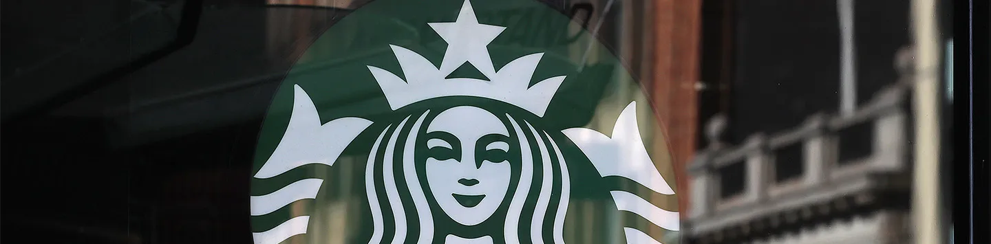 Starbucks logo on a storefront window