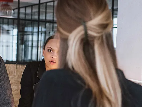 Co-workers collaborating around a table