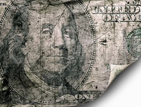 A damaged US $100 bill