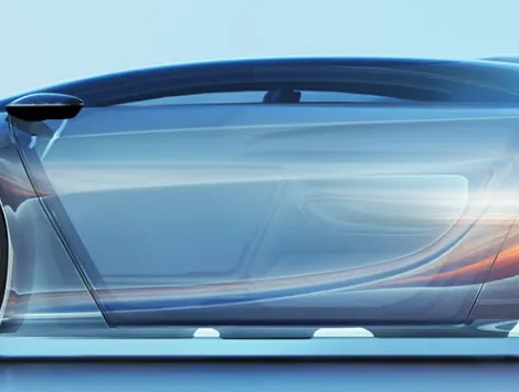 Digital generated image of futuristic car moving fast on blue surface.