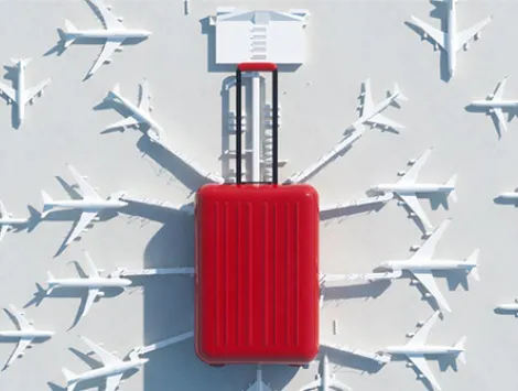 Digital generated image of huge red travel case stylized as airport terminal with planes around on white background.